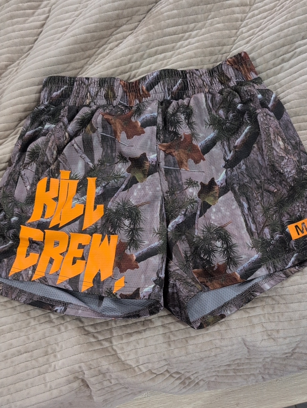 Kill Crew Women's Athletic Shorts - Camo with Bright Orange Logo